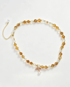 Handcrafted amber and crystal beaded bracelet with gold leaf charm, natural gemstone accessory for women