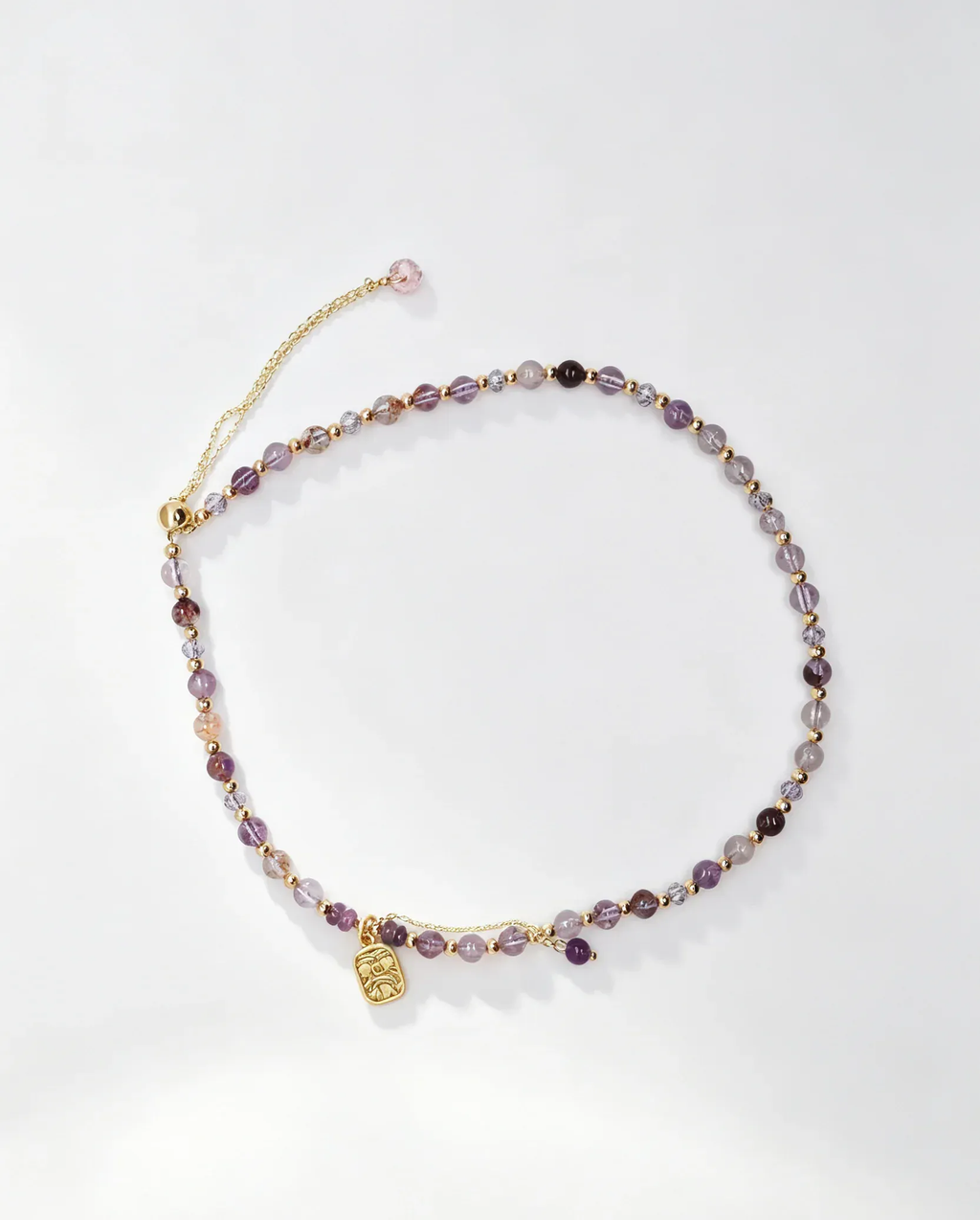 Purple crystal bracelet with gold charm, handcrafted healing gemstone accessory for women