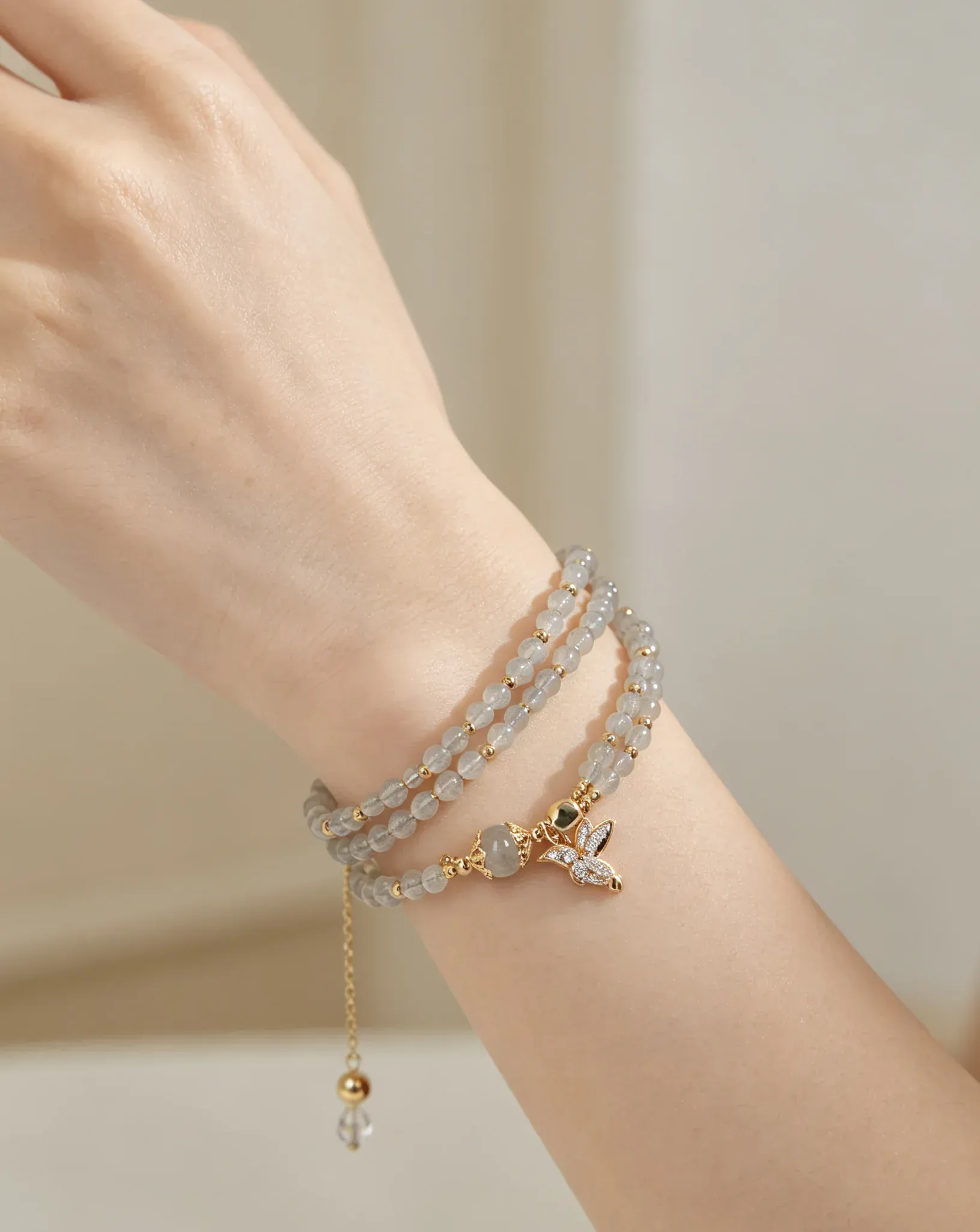 Layered natural crystal bracelet with gold bee charm, handcrafted healing gemstone accessory for women
