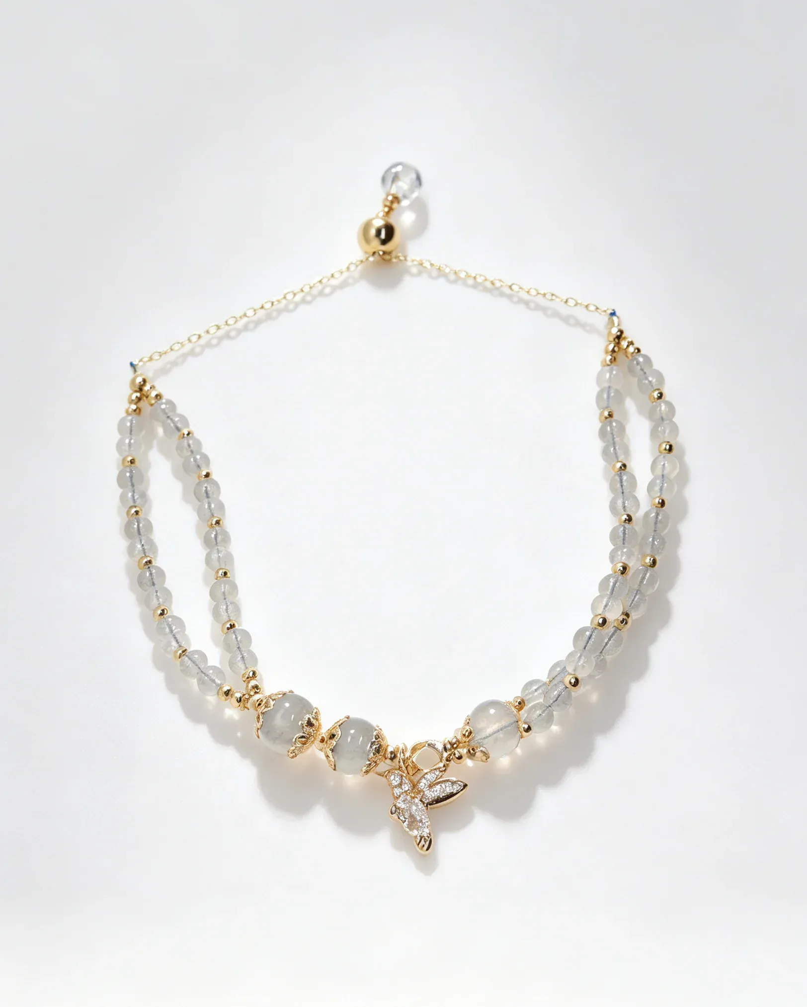 Handcrafted natural crystal necklace with gold hummingbird charm, genuine gemstone jewelry for women