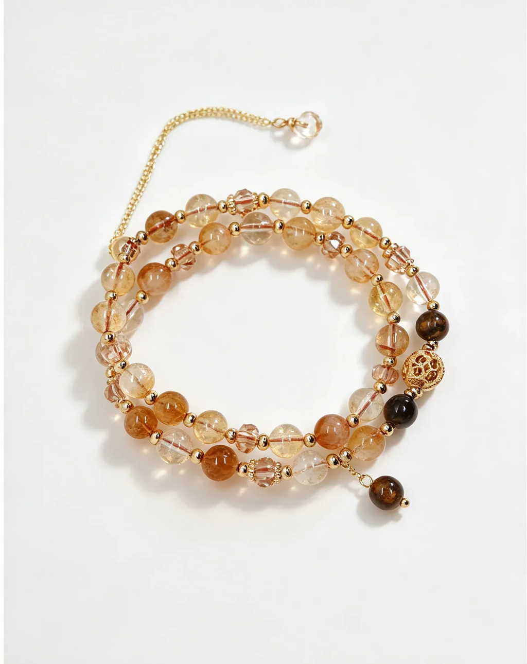 Layered natural crystal bracelet with gold beads and healing gemstones for positive energy