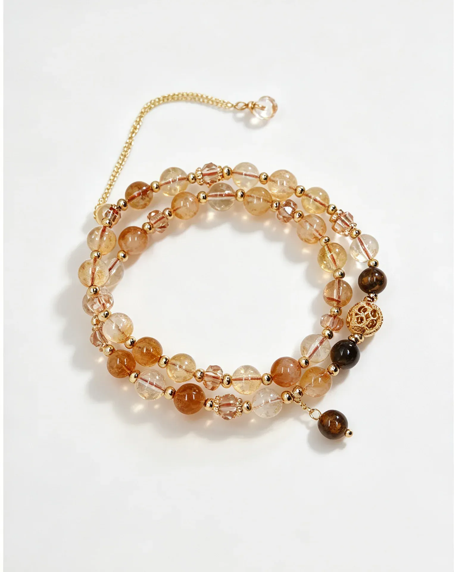 Layered natural crystal bracelet with gold beads and healing gemstones for positive energy