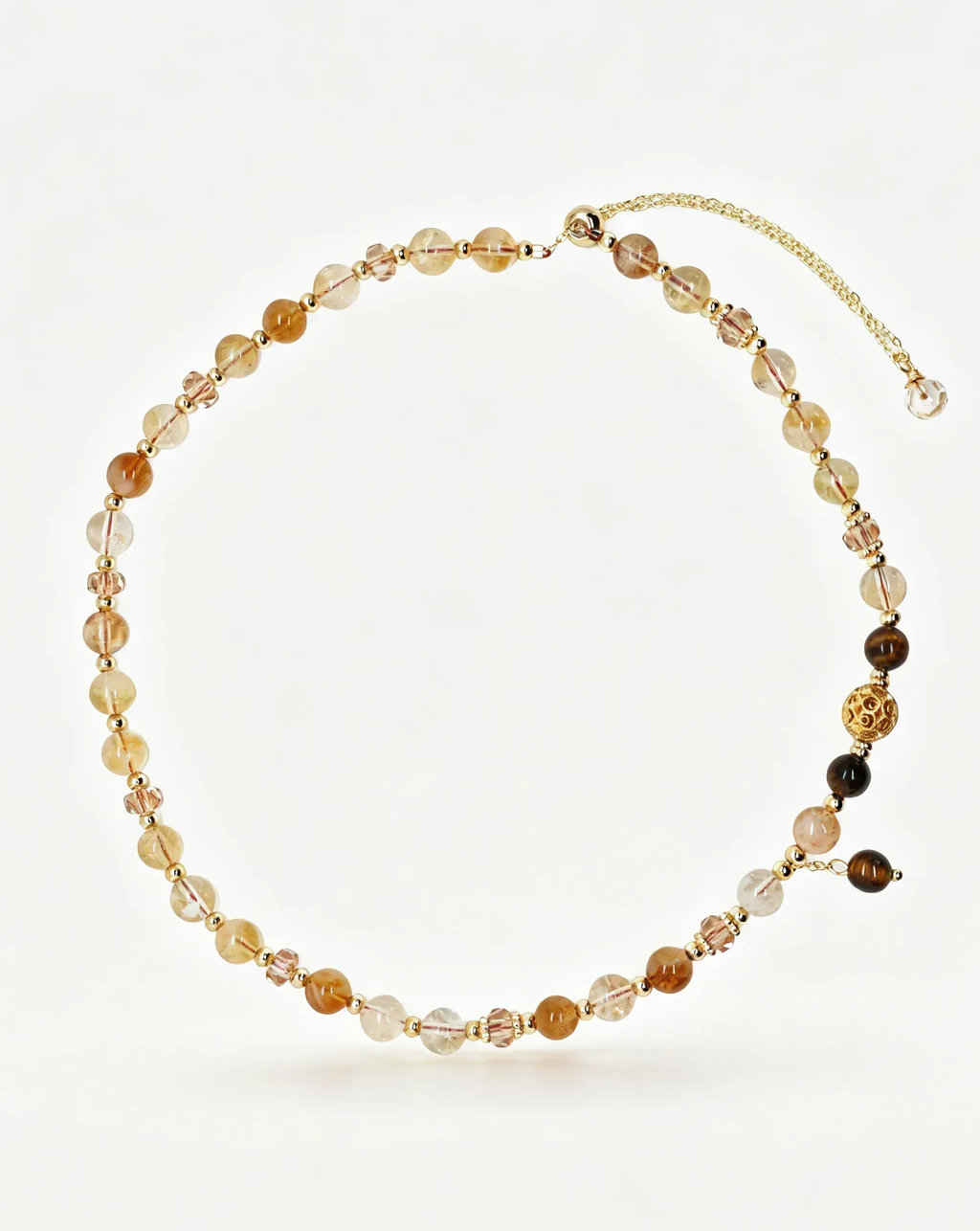 Handcrafted natural crystal bracelet with gold accents and healing gemstones for positive energy