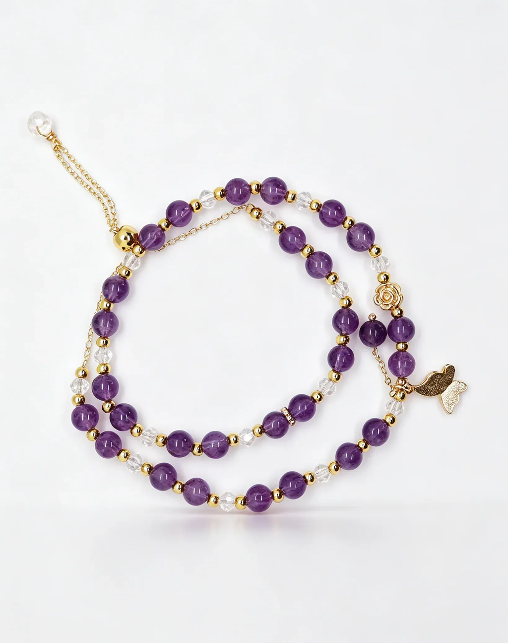 Amethyst and crystal beaded bracelet with gold butterfly charm, healing gemstone accessory for women
