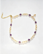 Handcrafted natural crystal bracelet with amethyst, citrine, and clear beads for positive energy and healing.