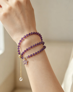 Amethyst crystal bracelet with gold flower charm, healing gemstone accessory for women