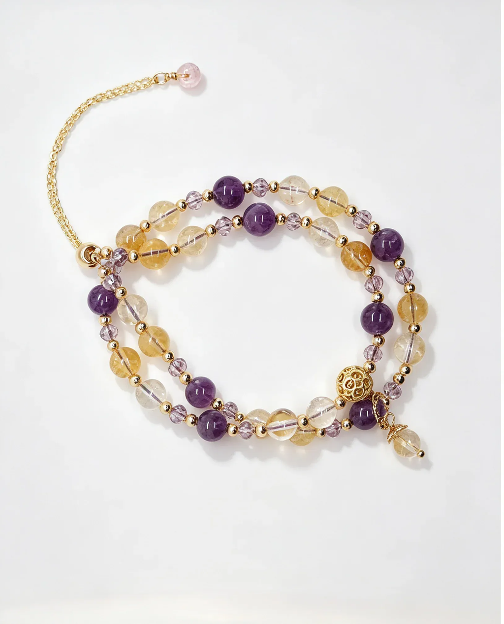 Layered amethyst and citrine crystal bracelet with gold beads for positive energy and healing