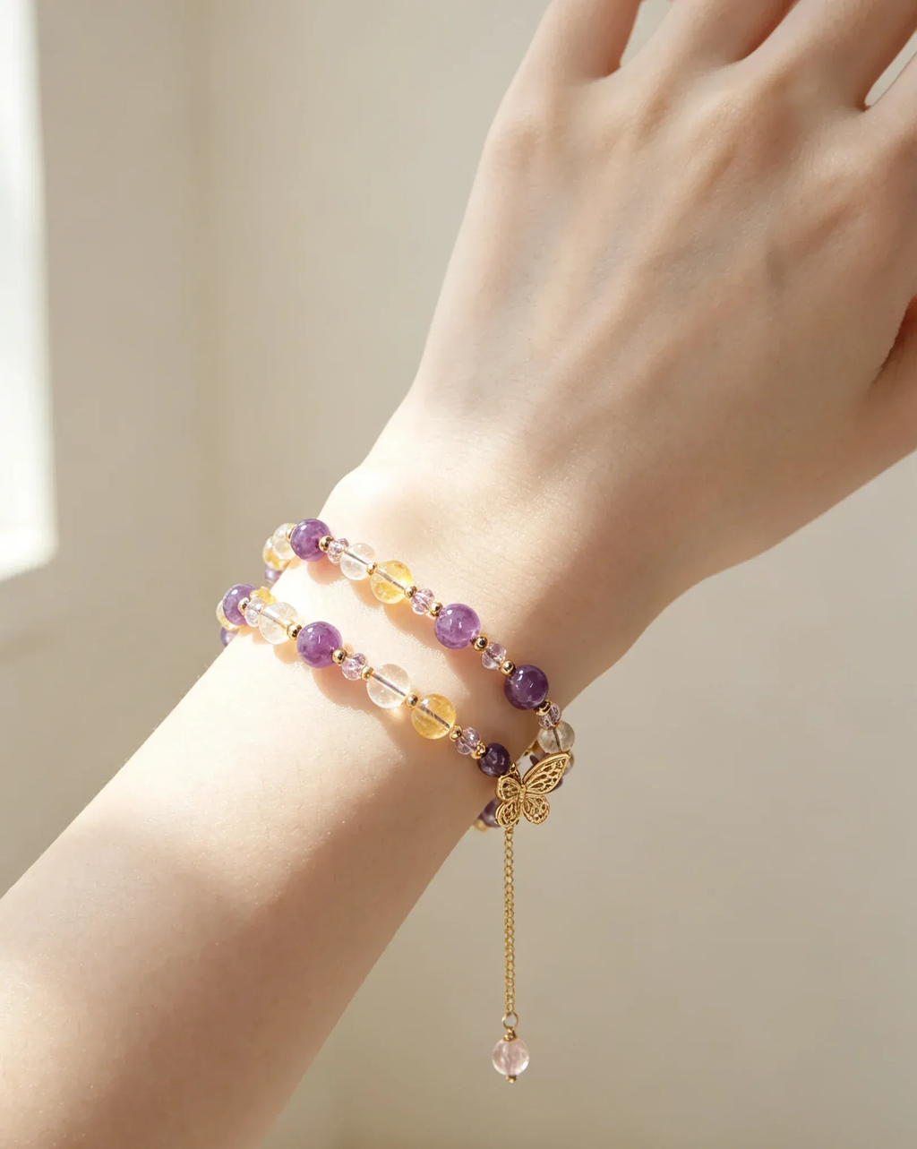 Amethyst and citrine crystal bracelet with gold butterfly charm, handcrafted healing gemstone accessory for women