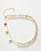 Handcrafted crystal bracelet with gold chain, heart charms, and natural gemstones for positive energy